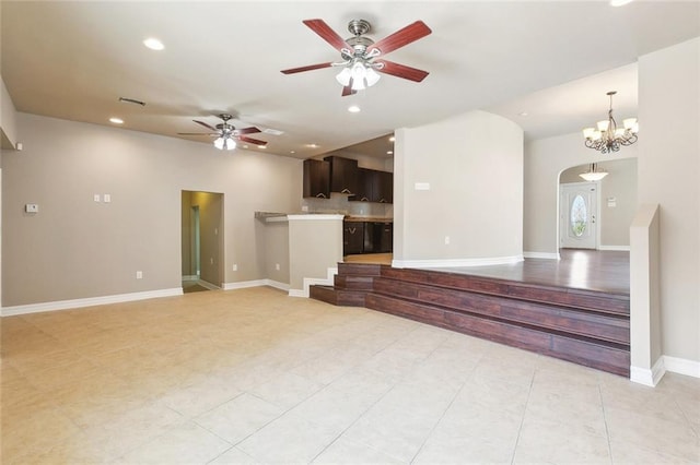 6409 Louis Xiv St, New Orleans, LA 70124 - unfurnished living room with recessed lighting, a ceiling fan, light tile patterned floors, baseboards, and a chandelier