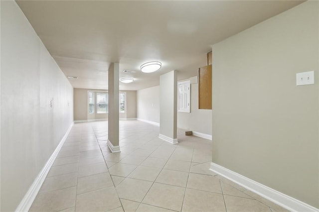 6409 Louis Xiv St, New Orleans, LA 70124 - basement featuring light tile patterned flooring and baseboards