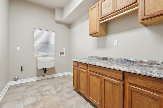 6409 Louis Xiv St, New Orleans, LA 70124 - washroom featuring washer hookup, cabinet space, gas dryer hookup, and baseboards