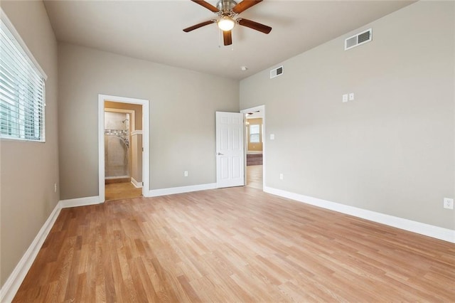6409 Louis Xiv St, New Orleans, LA 70124 - unfurnished bedroom featuring light wood-style flooring, multiple windows, and baseboards