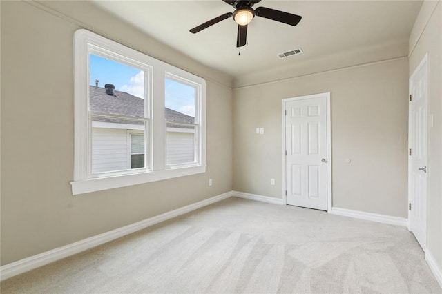 6409 Louis Xiv St, New Orleans, LA 70124 - unfurnished bedroom with light carpet, baseboards, and a ceiling fan