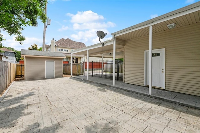 6409 Louis Xiv St, New Orleans, LA 70124 - view of patio with an outdoor structure