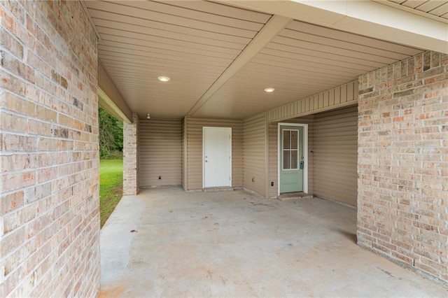 18349 Fox Hollow Loop, Hammond, LA 70401 - view of patio featuring an attached carport