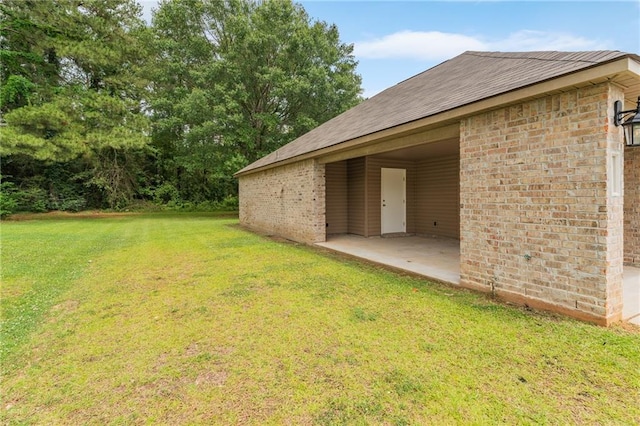 18349 Fox Hollow Loop, Hammond, LA 70401 - view of green lawn with a patio