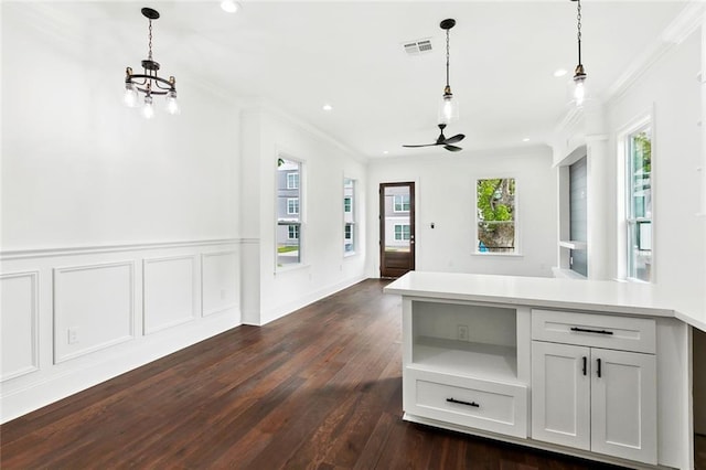 2824 Andover St, Jefferson, LA 70121 - kitchen with crown molding, dark wood-style flooring, hanging light fixtures, ceiling fan, and recessed lighting