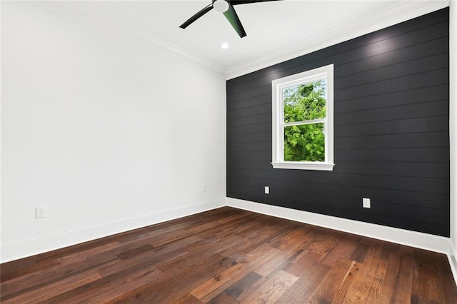 2824 Andover St, Jefferson, LA 70121 - empty room with baseboards, crown molding, dark wood-type flooring, and ceiling fan