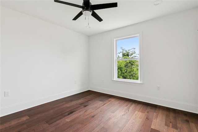 2824 Andover St, Jefferson, LA 70121 - unfurnished room featuring baseboards, dark wood-style flooring, and a ceiling fan