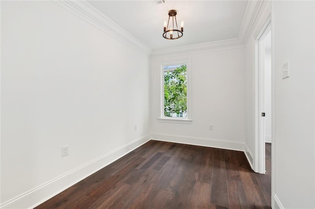 2824 Andover St, Jefferson, LA 70121 - empty room with a chandelier, dark wood-style floors, baseboards, and crown molding