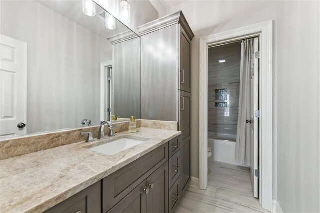 983 Lakeshore Blvd, Slidell, LA 70461 - bathroom featuring vanity, toilet, and shower / bath combination