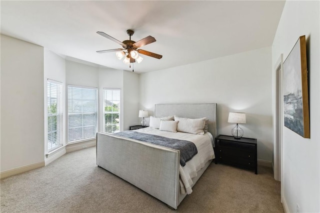 983 Lakeshore Blvd, Slidell, LA 70461 - bedroom with carpet floors, baseboards, and ceiling fan