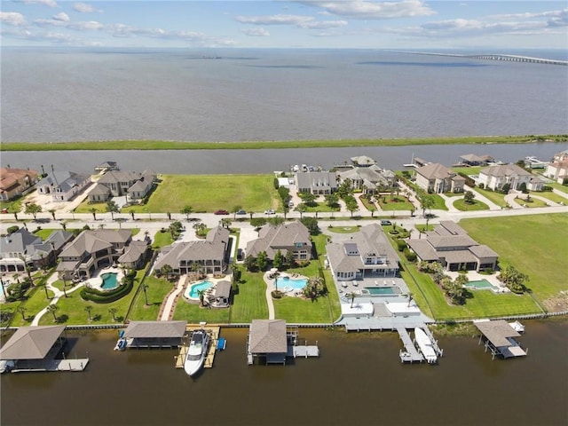 983 Lakeshore Blvd, Slidell, LA 70461 - aerial perspective of suburban area with a large body of water and a pool area