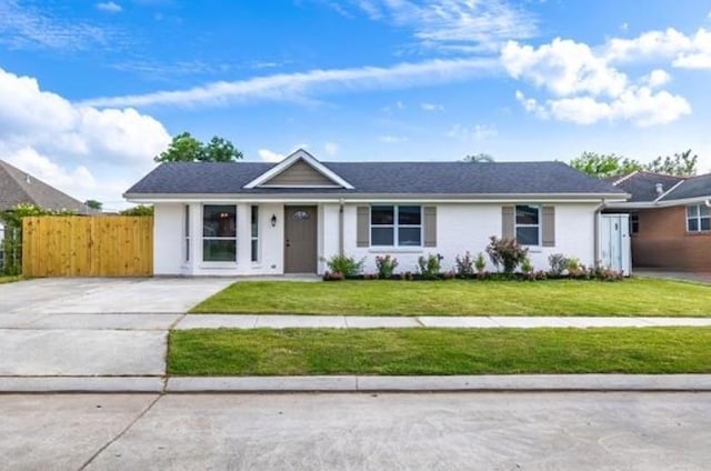 404 Alpaca Dr, Arabi, LA 70032 - ranch-style house with concrete driveway and stucco siding