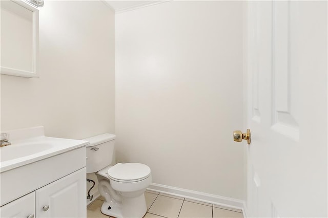 6345 Marshal Foch St, New Orleans, LA 70124 - half bathroom with vanity, toilet, tile patterned floors, and baseboards