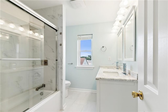 6345 Marshal Foch St, New Orleans, LA 70124 - bathroom with toilet, double vanity, baseboards, and bath / shower combo with glass door