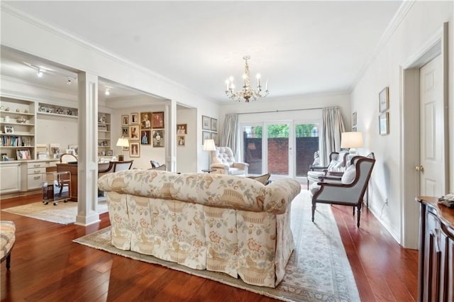 801 Rue Burgundy St Unit 113, Metairie, LA 70005 - living room with crown molding, a chandelier, and dark wood-style flooring