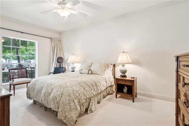 801 Rue Burgundy St Unit 113, Metairie, LA 70005 - bedroom with crown molding, light colored carpet, ceiling fan, and baseboards