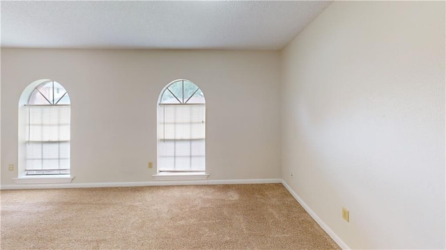 4813 Lake Como Ave, Metairie, LA 70006 - carpeted spare room featuring a textured ceiling and baseboards