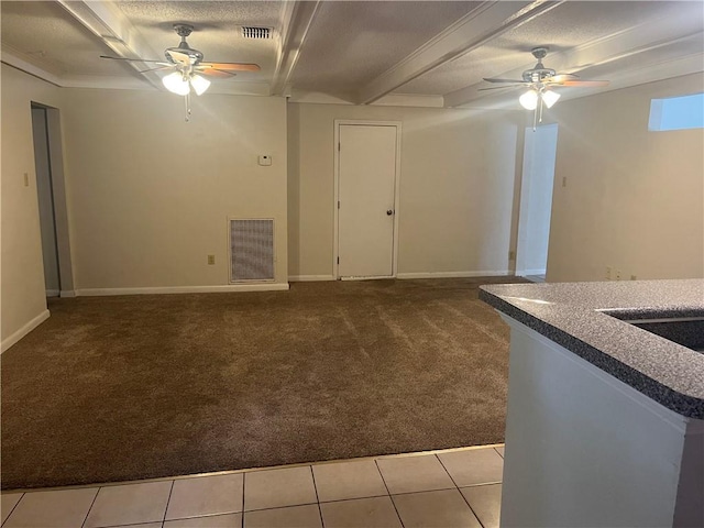 4813 Lake Como Ave, Metairie, LA 70006 - tiled spare room with ceiling fan, carpet floors, baseboards, a textured ceiling, and beamed ceiling