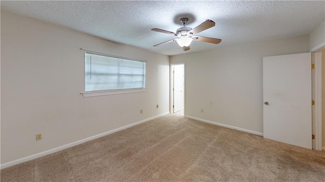4813 Lake Como Ave, Metairie, LA 70006 - carpeted empty room with ceiling fan, a textured ceiling, and baseboards