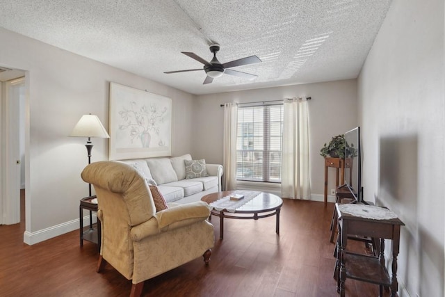3320 N Arnoult Rd Unit 231, Metairie, LA 70002 - living area featuring ceiling fan, wood finished floors, a textured ceiling, and baseboards