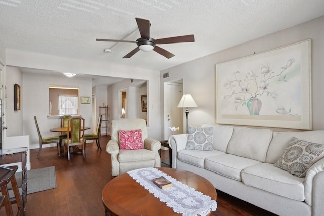 3320 N Arnoult Rd Unit 231, Metairie, LA 70002 - living area featuring ceiling fan, wood finished floors, and a textured ceiling