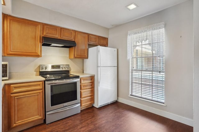 3320 N Arnoult Rd Unit 231, Metairie, LA 70002 - kitchen featuring stainless steel electric stove, under cabinet range hood, freestanding refrigerator, and light countertops