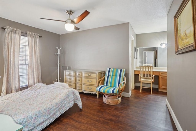 3320 N Arnoult Rd Unit 231, Metairie, LA 70002 - bedroom featuring dark wood finished floors, baseboards, and ceiling fan