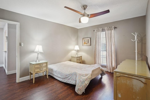 3320 N Arnoult Rd Unit 231, Metairie, LA 70002 - bedroom with multiple windows, dark wood finished floors, and baseboards