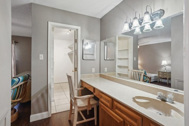 3320 N Arnoult Rd Unit 231, Metairie, LA 70002 - ensuite bathroom with vanity and wood finished floors
