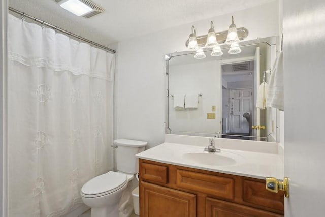 3320 N Arnoult Rd Unit 231, Metairie, LA 70002 - bathroom featuring toilet, vanity, and a shower with curtain