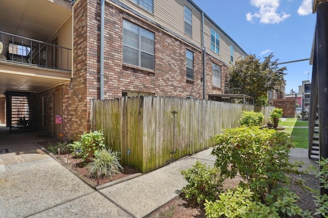 3320 N Arnoult Rd Unit 231, Metairie, LA 70002 - view of side of home featuring brick siding