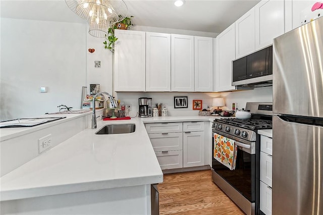 822 N Rampart St Unit 203, New Orleans, LA 70116 - half bath with toilet, wood finished floors, a sink, baseboards, and recessed lighting