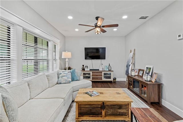 7599 Park Ave, Houma, LA 70364 - living area with dark wood finished floors, baseboards, a ceiling fan, and recessed lighting