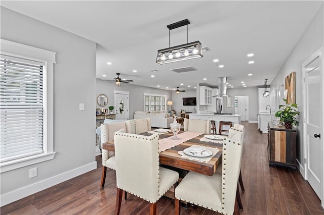 7599 Park Ave, Houma, LA 70364 - dining space featuring ceiling fan, healthy amount of natural light, dark wood-style flooring, baseboards, and recessed lighting