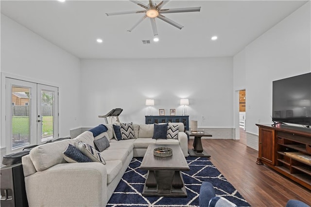 7599 Park Ave, Houma, LA 70364 - living area featuring ceiling fan, dark wood-type flooring, recessed lighting, french doors, and a high ceiling