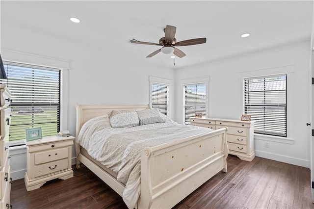 7599 Park Ave, Houma, LA 70364 - bedroom with dark wood-type flooring, baseboards, recessed lighting, and ceiling fan