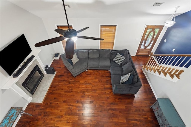 19196 Wildoak Ln, Ponchatoula, LA 70454 - living room with ceiling fan, wood finished floors, and a tiled fireplace