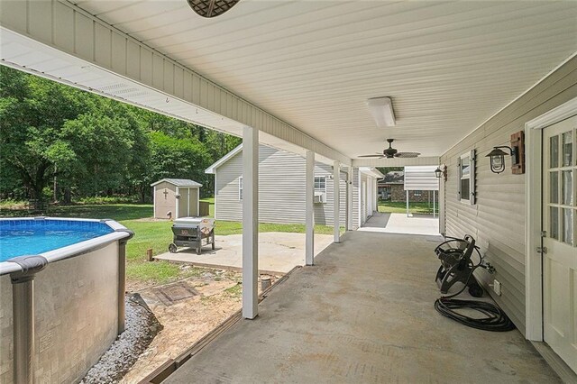 19196 Wildoak Ln, Ponchatoula, LA 70454 - view of patio featuring ceiling fan and an outdoor pool