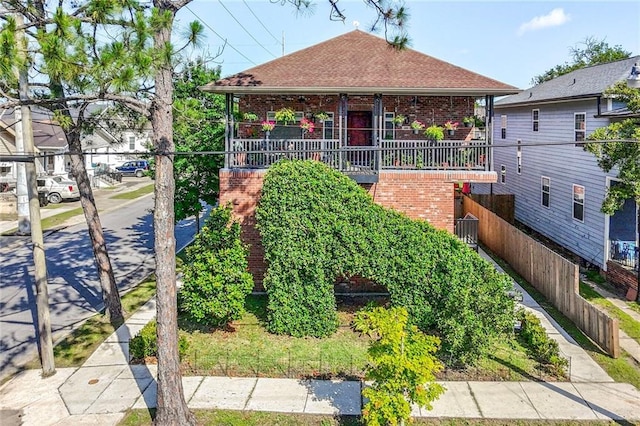 439 S Clark St, New Orleans, LA 70119 - bungalow-style house featuring brick siding and a shingled roof