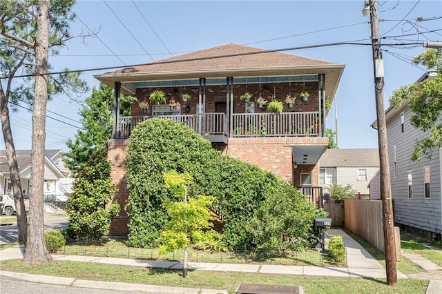 439 S Clark St, New Orleans, LA 70119 - view of front of property with brick siding and a shingled roof