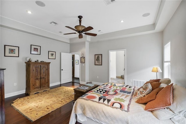 439 S Clark St, New Orleans, LA 70119 - bedroom featuring dark wood-type flooring, baseboards, recessed lighting, ceiling fan, and a raised ceiling