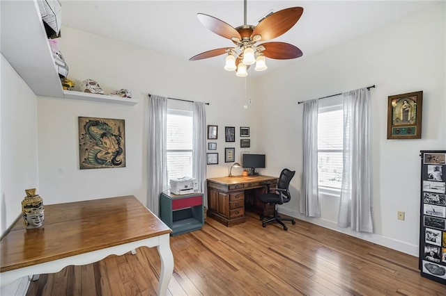 439 S Clark St, New Orleans, LA 70119 - office area with light wood-style floors and ceiling fan
