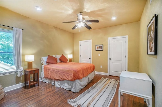 439 S Clark St, New Orleans, LA 70119 - bedroom with baseboards, wood finished floors, a ceiling fan, and recessed lighting