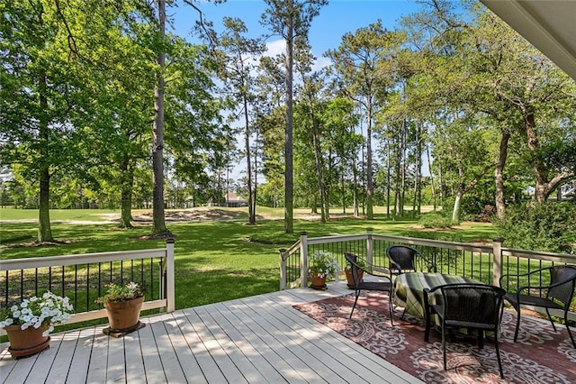 511 Beau Chene Dr, Mandeville, LA 70471 - wooden terrace featuring a yard and view of scattered trees