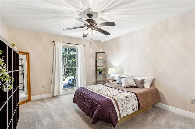 511 Beau Chene Dr, Mandeville, LA 70471 - carpeted bedroom featuring baseboards and ceiling fan