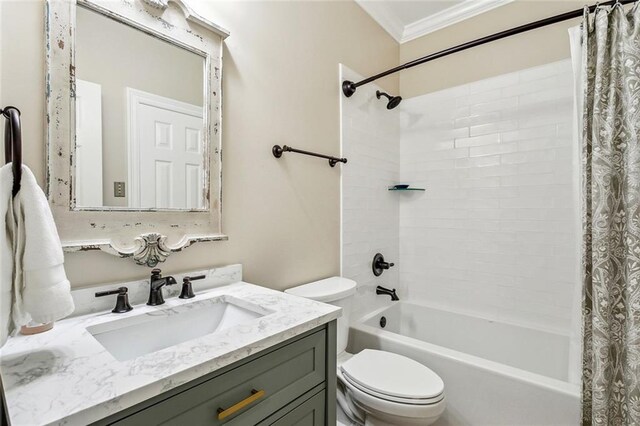 511 Beau Chene Dr, Mandeville, LA 70471 - full bathroom featuring toilet, shower / bath combo with shower curtain, vanity, and crown molding