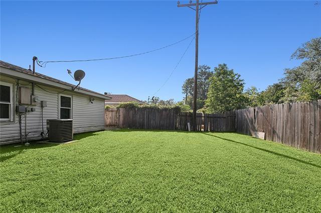 312 Raleigh Dr, Slidell, LA 70460 - view of yard featuring central AC unit