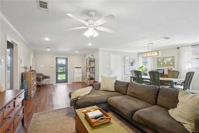 4709 Kawanee Ave, Metairie, LA 70006 - living room featuring dark wood finished floors, ceiling fan, ornamental molding, baseboards, and recessed lighting