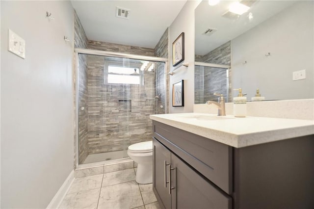 4709 Kawanee Ave, Metairie, LA 70006 - full bath with vanity, toilet, a shower stall, and marble finish floors