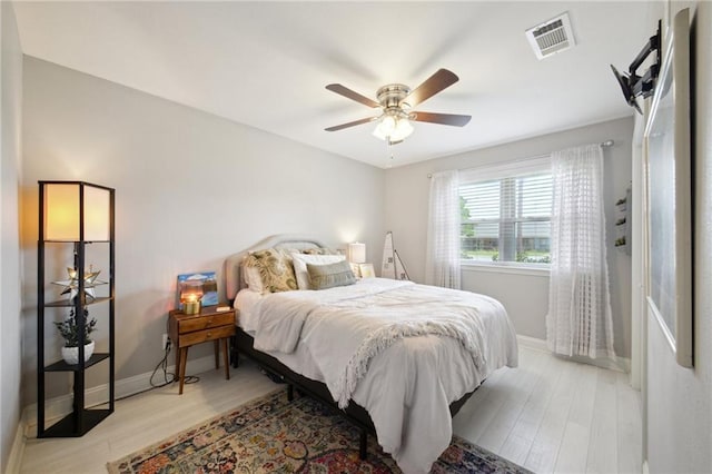 4709 Kawanee Ave, Metairie, LA 70006 - bedroom featuring light wood-style floors, baseboards, and ceiling fan